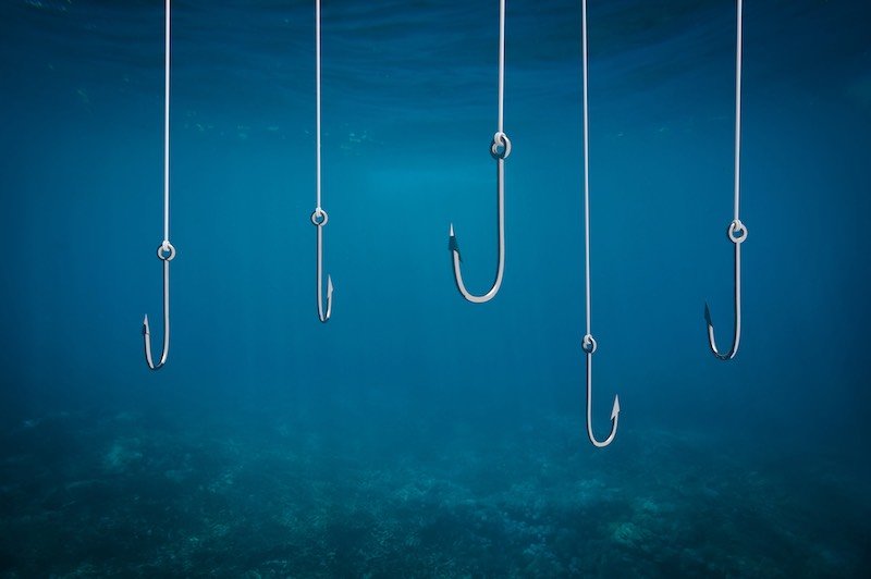 Many fishing hooks in the water
