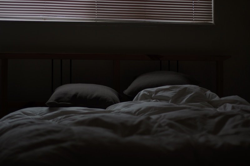 Dim the lights in your bedroom for a deeper sleep